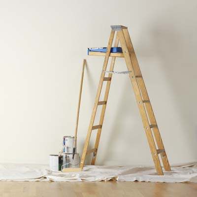 ladder, paint trays, rollers, paint cans, dropcloth