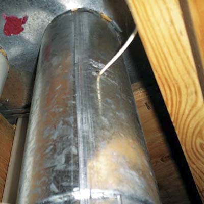 home alarm wire run through the vent pipes from basement to attic