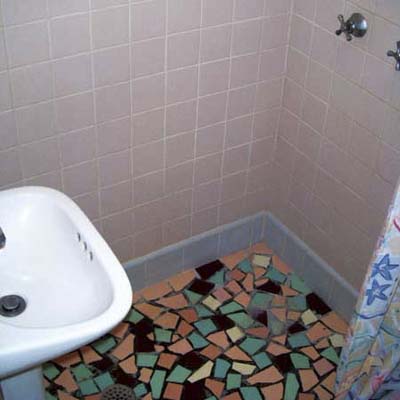 working sink installed inside a working shower stall