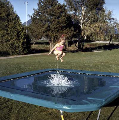 an outdoor trampoline that can be used with or without a layer of water