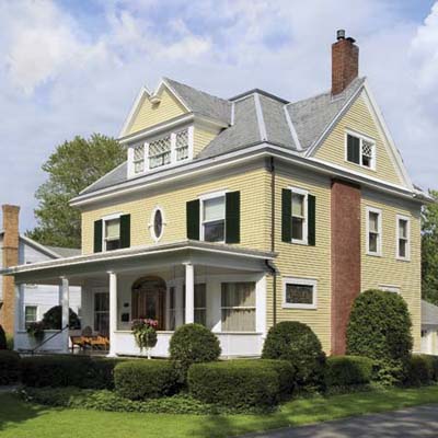 remodel in Seneca Falls, NY with new paint job, shutters and porch planters
