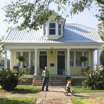 remodel in Baton Rouge, LA with new paint job, salvaged brick front step, and decorative lattice
