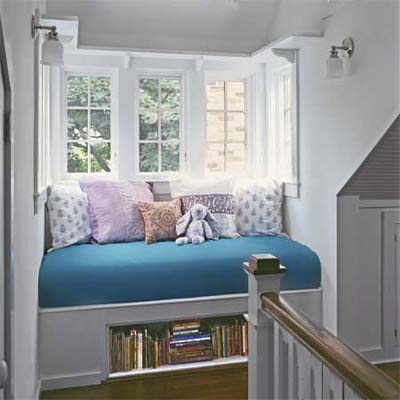 build a wall-to-wall window seat on the stair landing