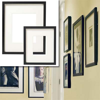 examples of gallery frames inset in the image of the decorated hallway of this remodeled bungalow kitchen