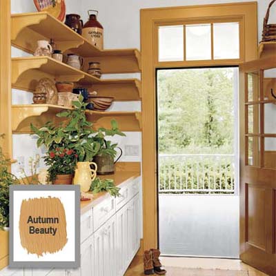 painted moldings around white walls and cupboards seems to expand the room