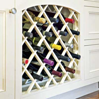 built in wine storage below the counter in this remodeled kitchen