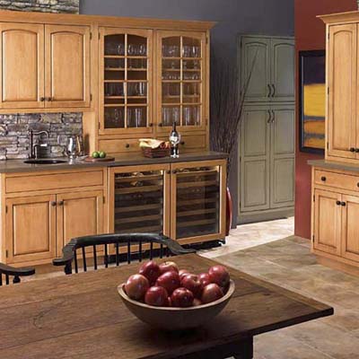beautiful kitchen with crowned cabinets with a custom woodwork look