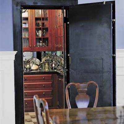 Post office transformed into a home. This is the dining  room with cherry cabinets