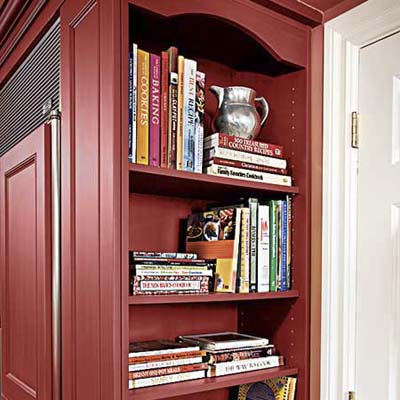 shelf unit at the end of refrigerator wall