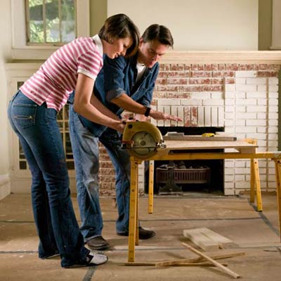 contractor explaining something to woman