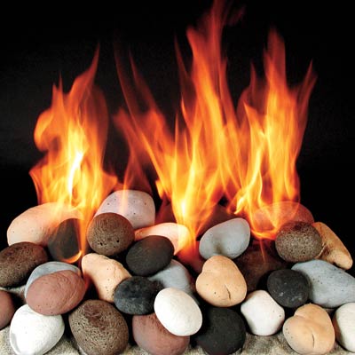 a gas fireplace bed made of ceramic made to look like calico-colored stones