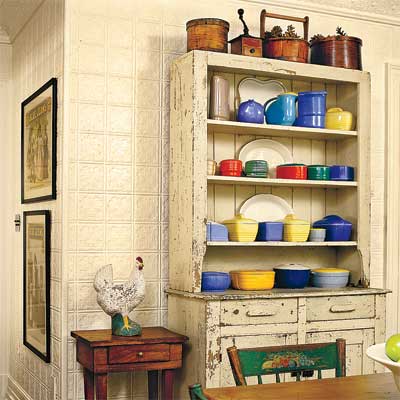 example of tin ceiling tiles used as wall covering
