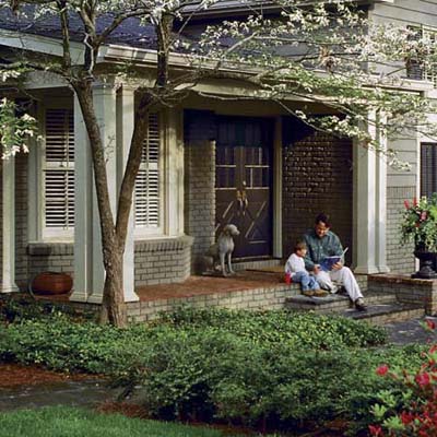 a closeup of a house with a new paint job and entryway makeover