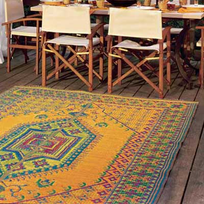 outdoor dining table in curtained alcove