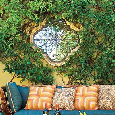metal framed mirror on exterior wall