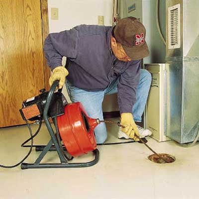 repairing a clogged floor drain