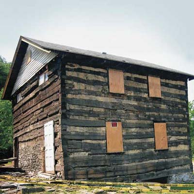 a log cabin in Elizabeth Township, PA that is still up for sale