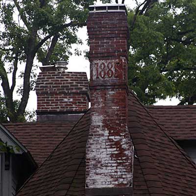 efflorescence on brick chimney