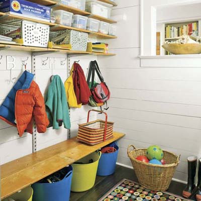 mudroom with shelving, coat hooks and bench
