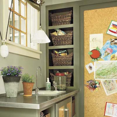 mudroom with sink, pantry and storage