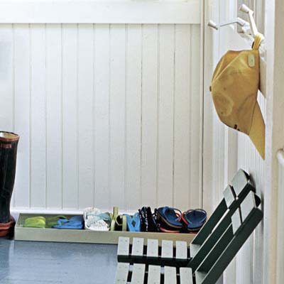 enclosed porch with window cranks and boot tray
