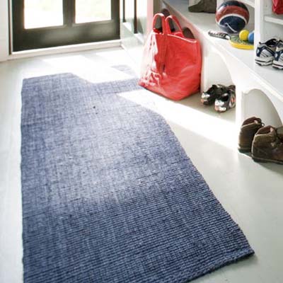 blue sisal runner rug on mudroom floor
