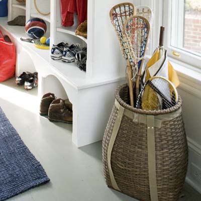 oversize basket holds lacrosse sticks and umbrellas