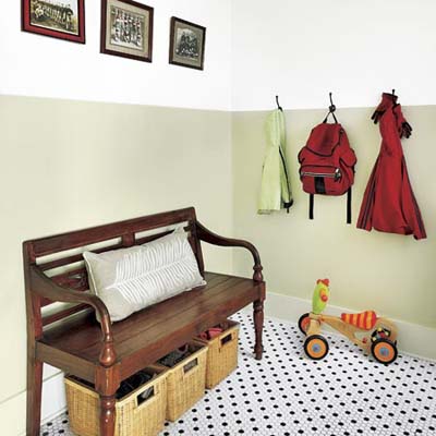 mudroom with tile floor and wood bench
