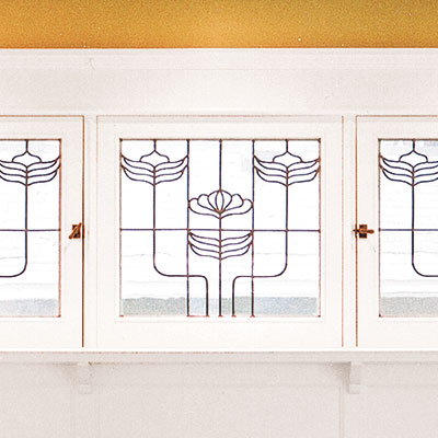 home office with art glass windows
