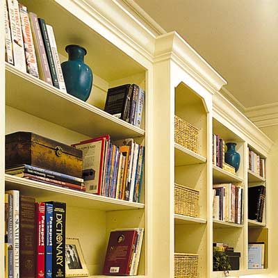 wall of bookshelves in home office