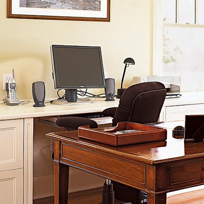 home office with writing desk and computer desk