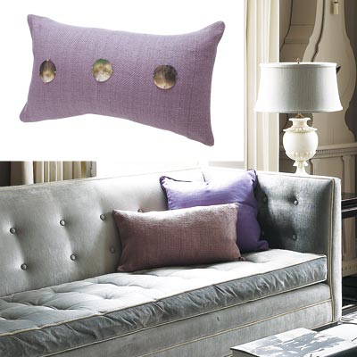gray toned living room with lavender colored pillow