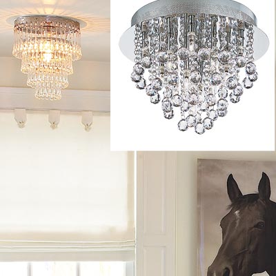 white kitchen with chandelier