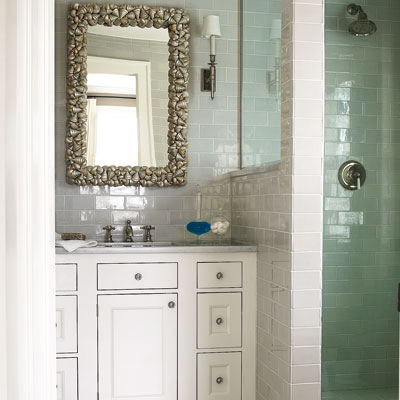 bathroom with white tiled walls and white vintage vanity