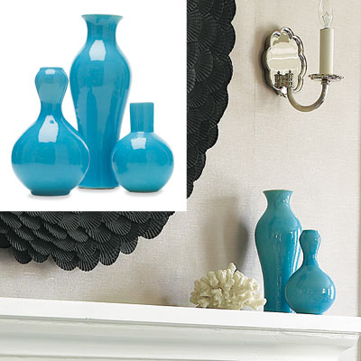 blue vases on fireplace mantel in serene home