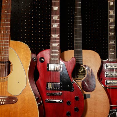 guitars stored in home office hobby nook