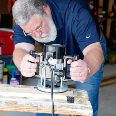 man milling poplar plywood