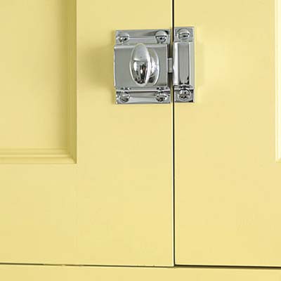 old-fashioned latches on the uppermost cabinets in this remodeled italianate kitchen 