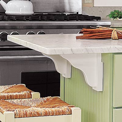 farmhouse kitchen with decorative carved wood supports