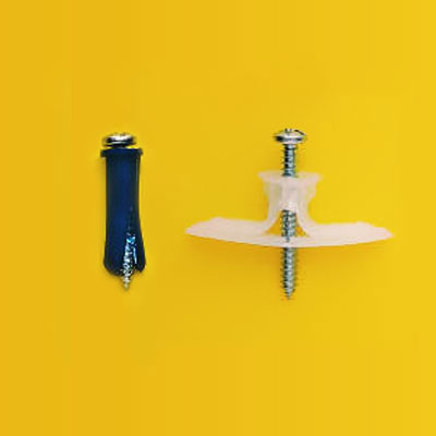 two types of expanding plastic sleeves/ fasteners for hanging frames on hollow walls