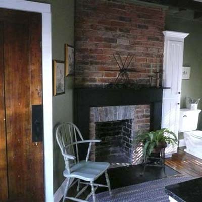 Renovated bathroom with fireplace
