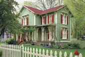 remodeled blue colonial house