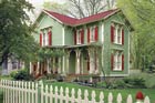 remodeled blue colonial house