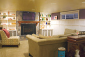 finished basement with movie screen