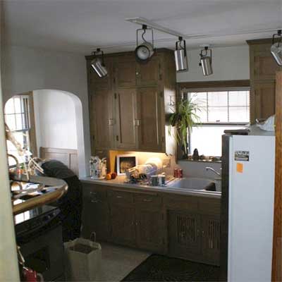 unfinished kitchen with track lighting