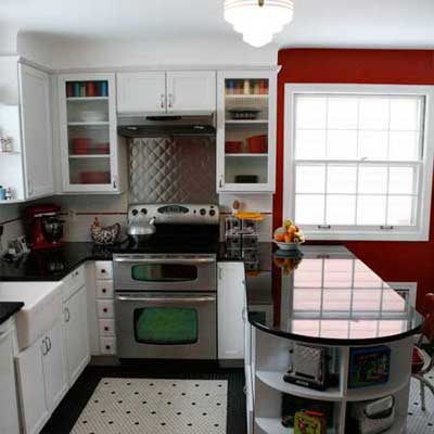 updated retro kitchen with red accent wall