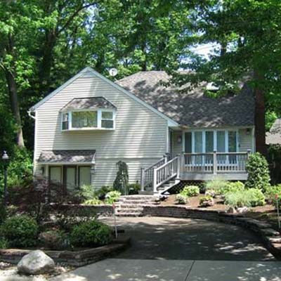 renovated house with landscaping