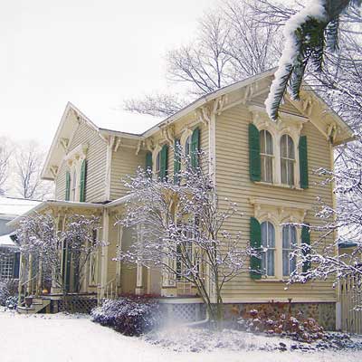 outdated victorian home in winter