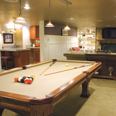 updated basement family room with pool table