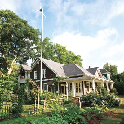old cottage with modern green remodel